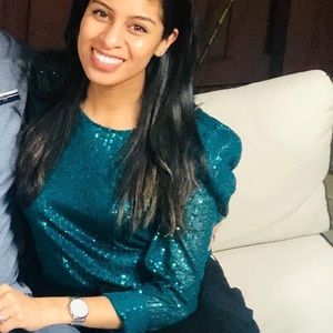 Green long sleeved sparkle top